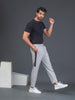 "DynamicFlex Men's Light Grey 4-Way Lycra Track Pants: Unleash Your Movement"