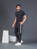"DynamicFlex Men's Black 4-Way Lycra Track Pants: Unleash Your Movement"