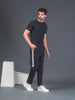 "DynamicFlex Men's Black 4-Way Lycra Track Pants: Unleash Your Movement"