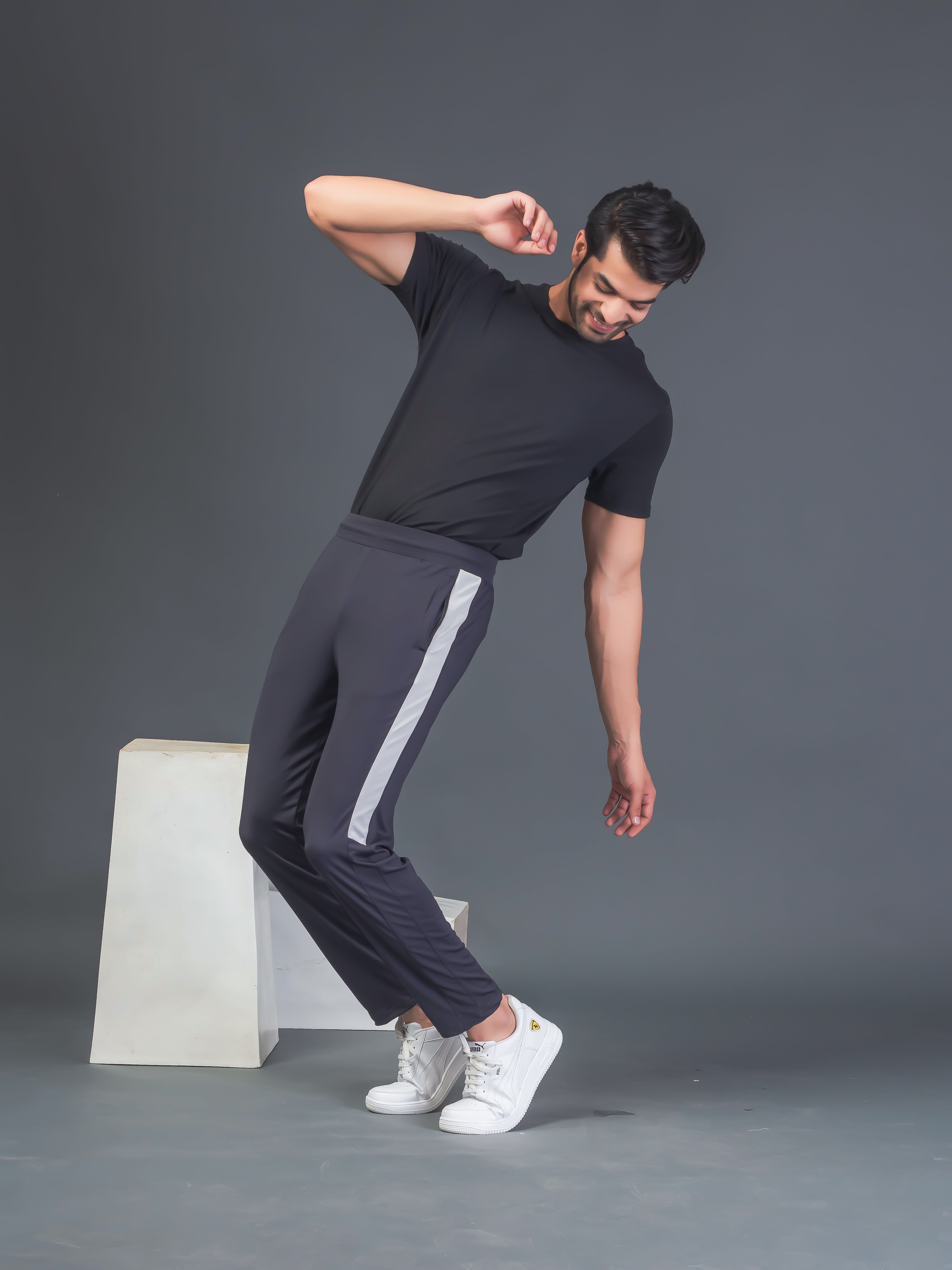"DynamicFlex Men's Dark Grey 4-Way Lycra Track Pants: Unleash Your Movement"