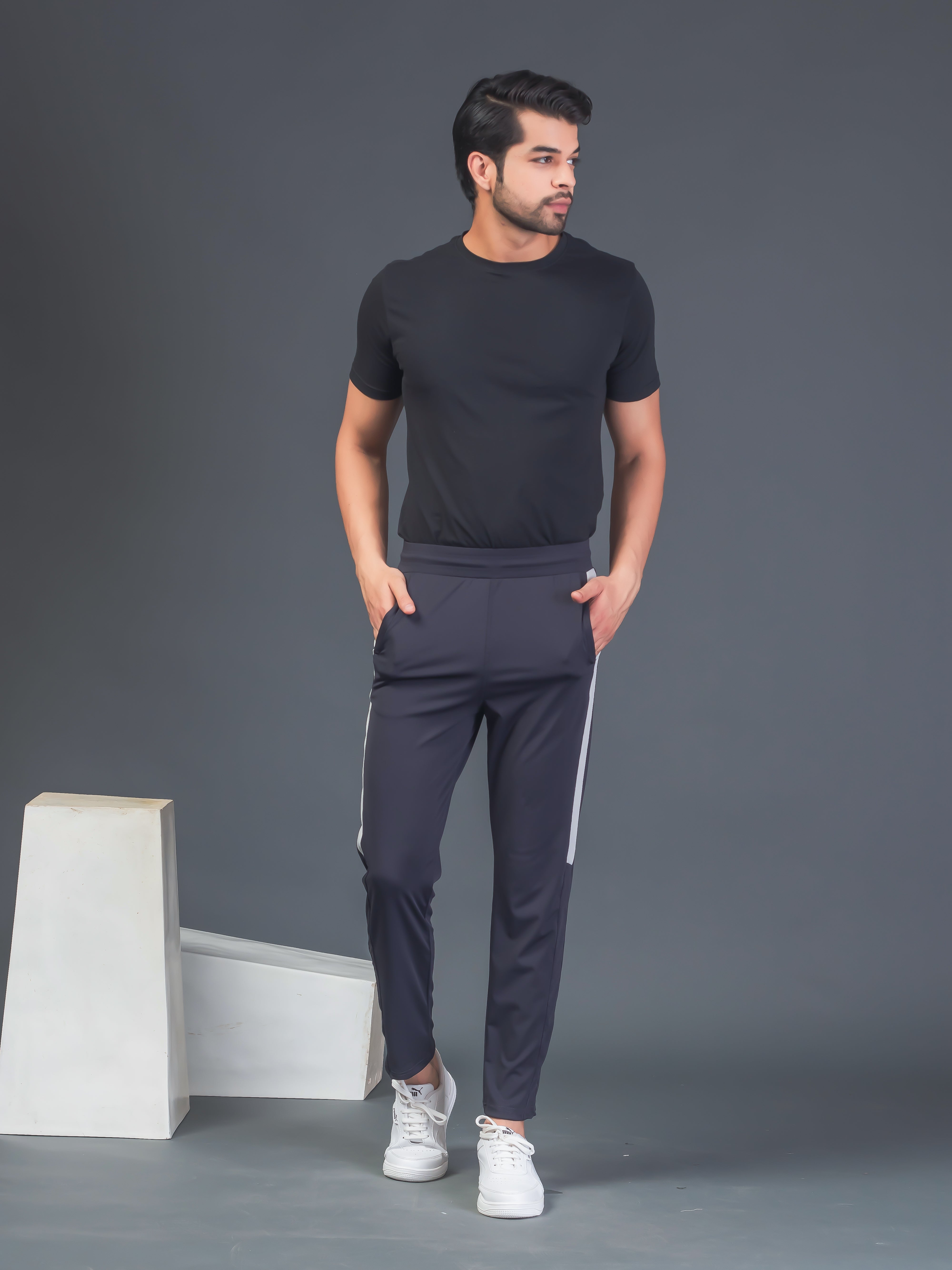 "DynamicFlex Men's Dark Grey 4-Way Lycra Track Pants: Unleash Your Movement"
