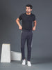 "DynamicFlex Men's Dark Grey 4-Way Lycra Track Pants: Unleash Your Movement"