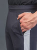 "DynamicFlex Men's Dark Grey 4-Way Lycra Track Pants: Unleash Your Movement"